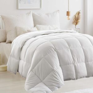 White Comforter on Bed